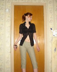 Рыжая бесстыдница раздевается в комнате 21 фотография Рыжая бесстыдница раздевается в комнате 21 фотография