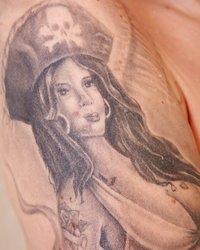 Рыжеволосая любительница тату принимает ванную 10 фотография Рыжеволосая любительница тату принимает ванную 10 фотография